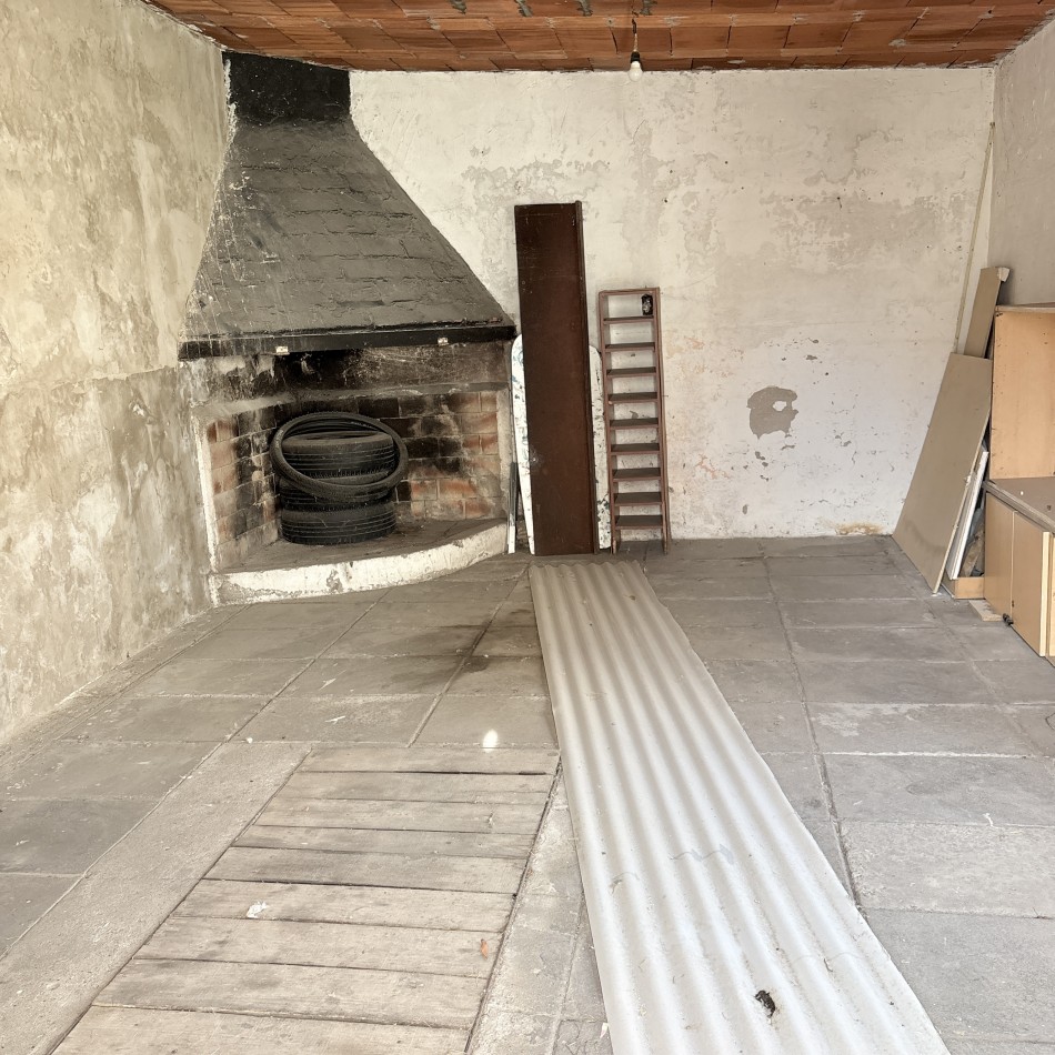 Venta de casa 3 ambientes con garage y parque en el Gaucho